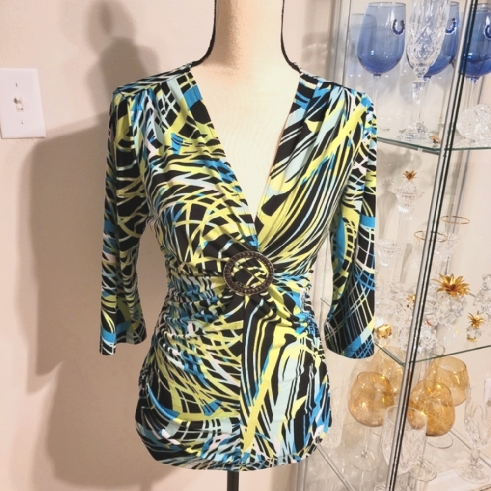 EUC- WOW..VIBRANT BRIGHT COLORED DEEP PLUNGE 3/4 SLEEVE BLACK STONE BLINGED TOP